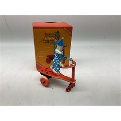 Seven modern Chinese, Japanese and Continental boxed tin-plate toys including Ucan Daire Flying Saucer, Drumming Animal, Circus Clown, Puzzle Cat, Bird with Jumping Action etc; and a quantity of clockwork toy keys (7)