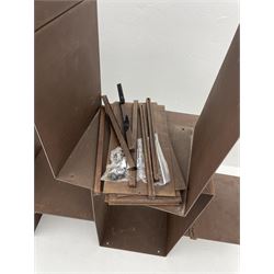 Retailed by The Conran Shop - four sectional modular shelving units, rusted metal finish, each unit - W212cm, H71cm, D33cm