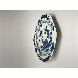 Mid 18th century Bow porcelain blue and white plate, of octagonal form painted with flowering chrysanthemums, rockwork, and fence upon a white ground, D19cm