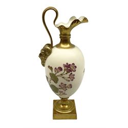 Royal Worcester blush ivory ewer with a satyr mask handle and decorated with floral sprays, raised on a gilt square base, with pattern number 1144 and date code for 1888 beneath, H28cm 