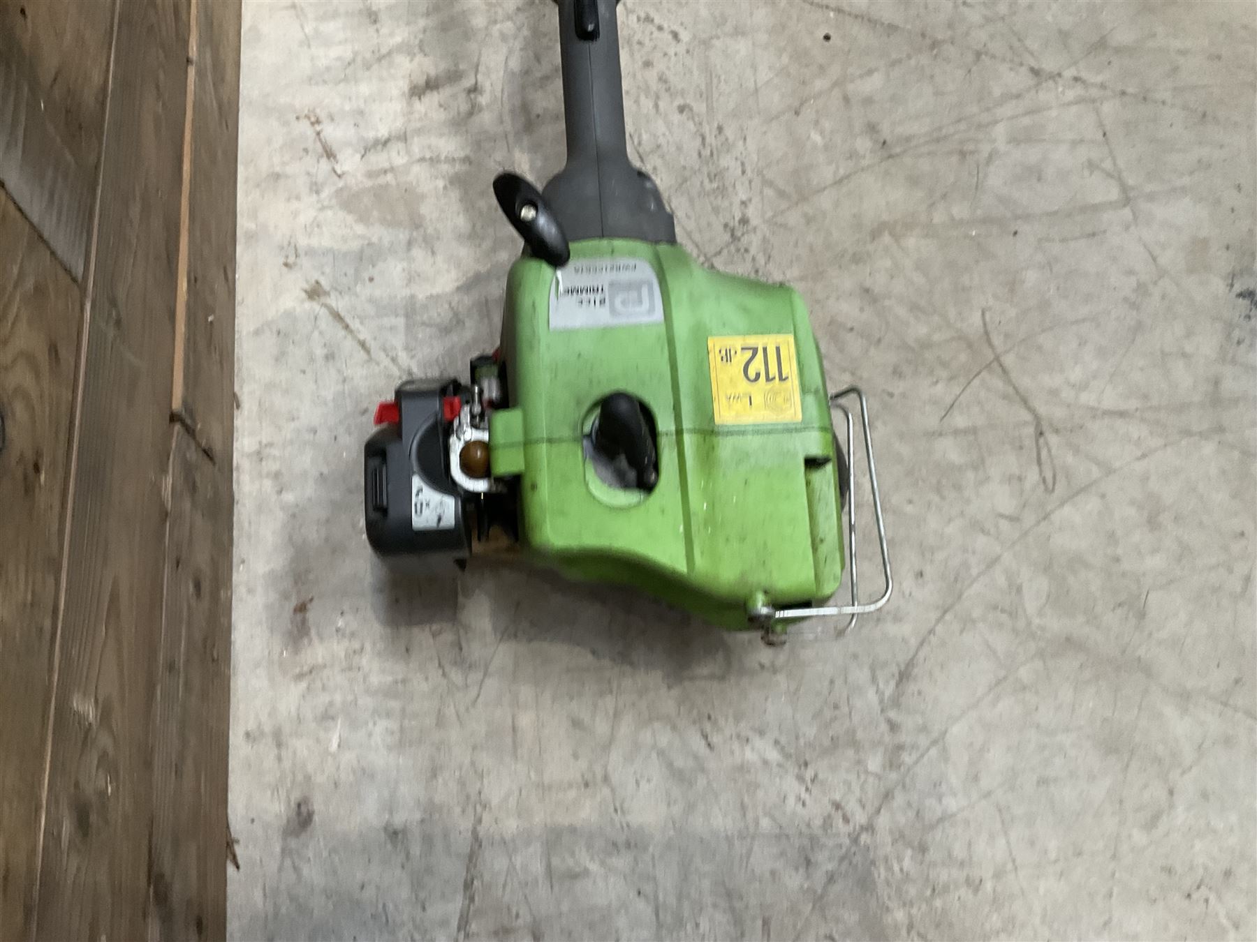 Petron PWR21CCGTA strimmer and a Spear & Jackson 1400W 2in1 Scarifier & Raker