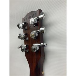 2012 American Gibson Les Paul Studio electric guitar, retro fitted with iron gear pick-ups, push-pull 'pots', roller bridge, string butler and locking machines, serial no.115321594, L99cm overall; in Gibson soft carrying case.