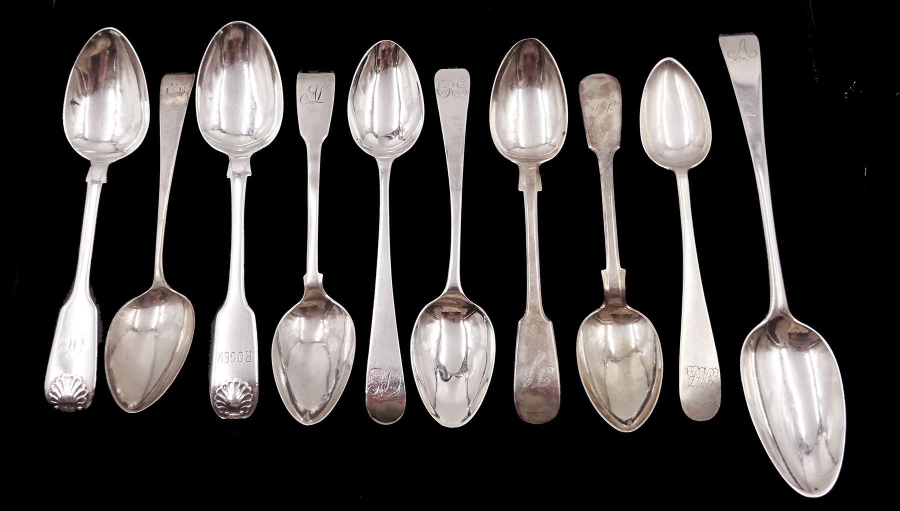 Collection of ten Newcastle silver teaspoons, comprising two Fiddle Shell pattern teaspoons, the first example hallmarked Reid & Sons, Newcastle 1859, and the second example hallmarked Thomas Sewell I, Newcastle 1856, together with four Fiddle pattern teaspoons and four Old English pattern teaspoons, with varying maker's including 	Thomas Wheatley and John Robertson II & John Walton, dated between 1821 and 1836 but most without date letters 