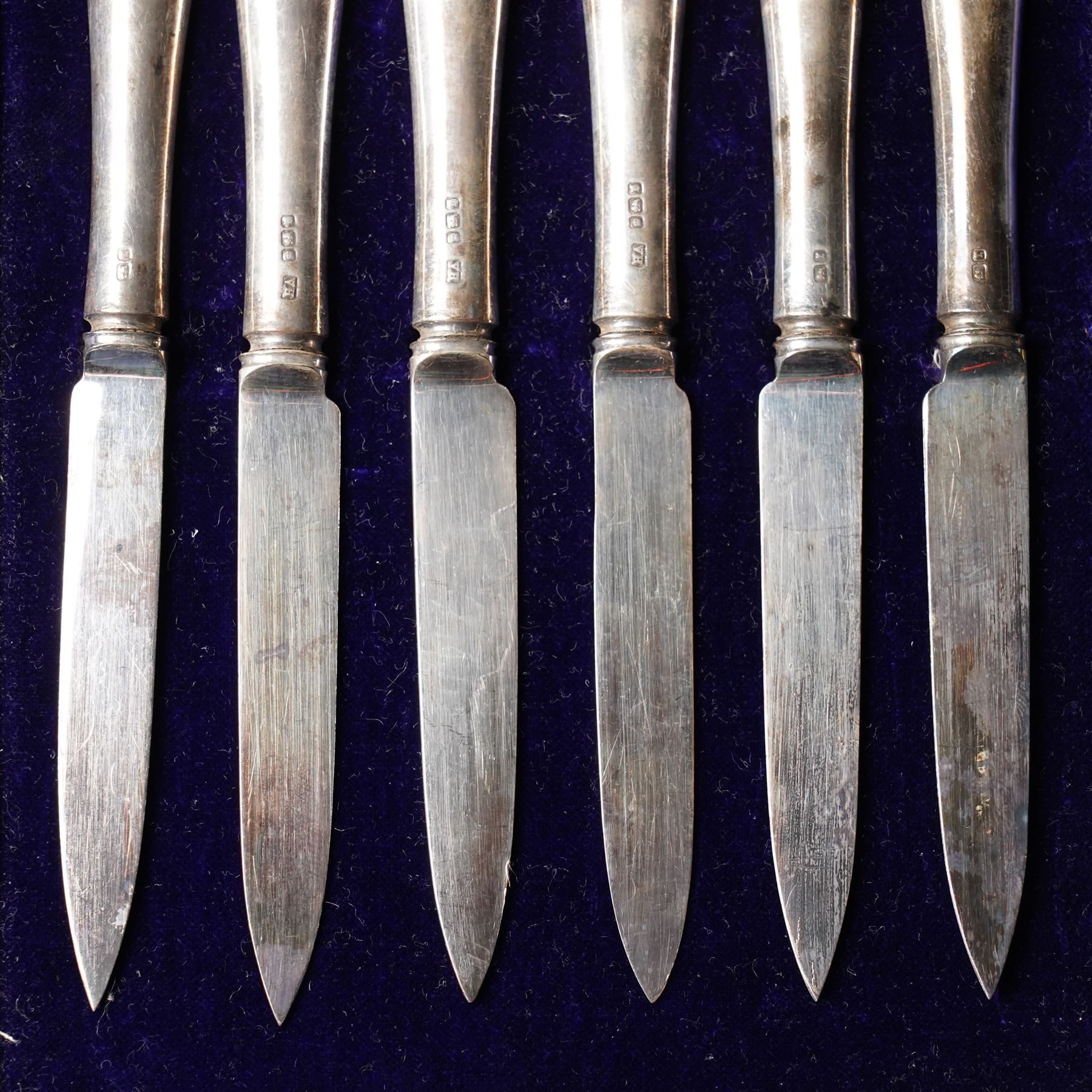 Set of six silver coffee spoons with examples of various British hallmarks , boxed, a set of six silver coffee spoons Sheffield 1925 Maker John Round & Son Ltd and six silver handled pastry knives