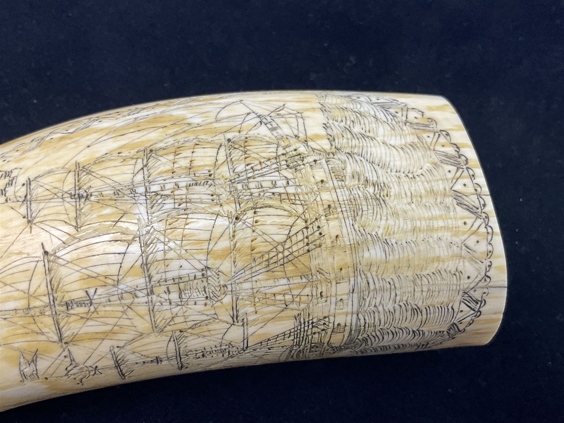 19th century scrimshaw sperm whale tooth from the whaler 'Dove' initialled J.A, Notes, Dove was a Union whaling boat, built at Newbury. Tt was scuttled as part of the Second Stone Fleet on January 25th-26th, 1862, in an attempt to block Charleston Harbor. The captain of the Dove was Captain James Wells Green Port. There were five members of the crew had the initials J.A, any of which could have created the scrimshaw.