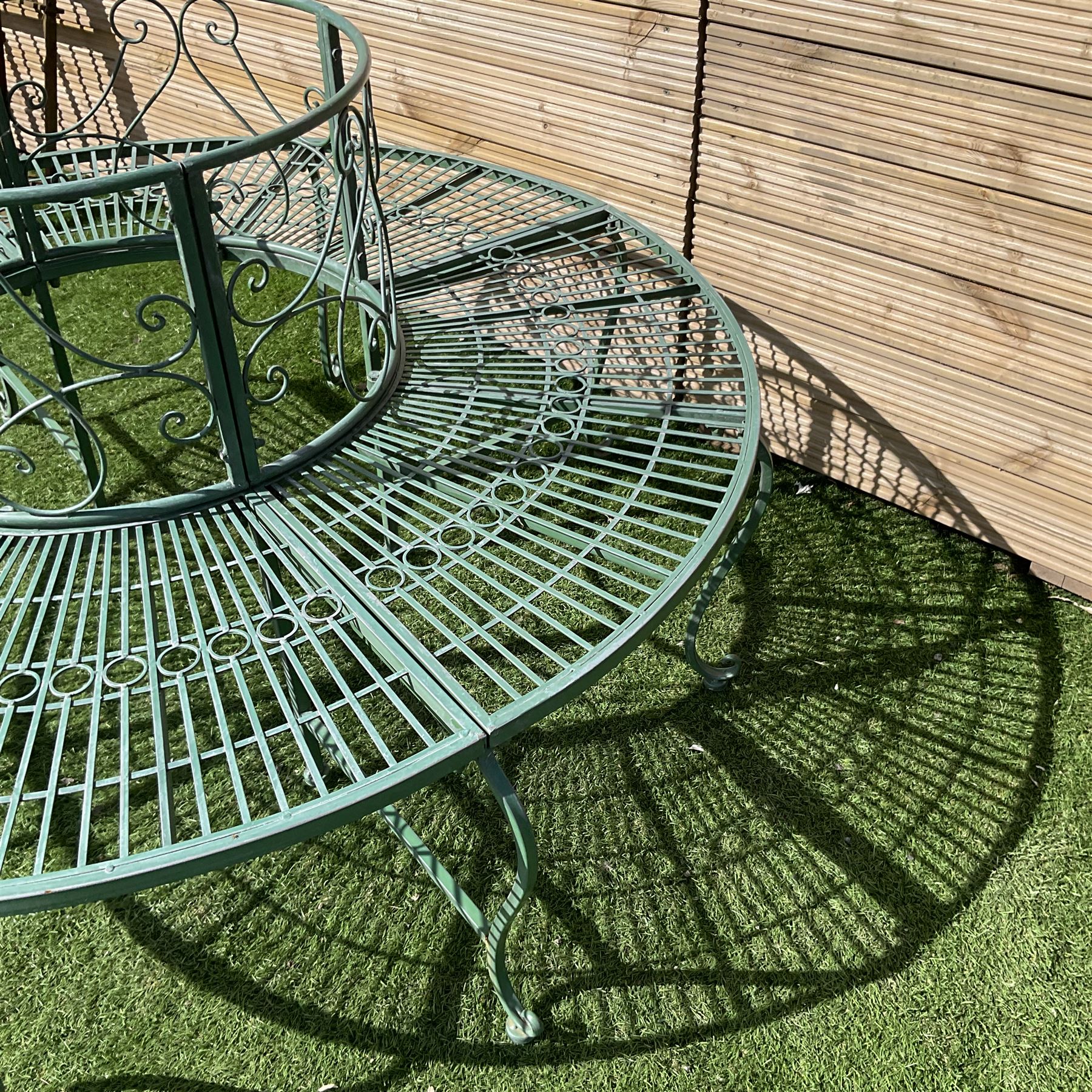 Regency design full tree bench, the scrolled back over strap seat with circular decoration, on cabriole front supports - THIS LOT IS TO BE COLLECTED BY APPOINTMENT FROM DUGGLEBY STORAGE, GREAT HILL, EASTFIELD, SCARBOROUGH, YO11 3TX