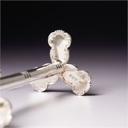 Pair of late Victorian silver knife rests with scroll moulded decoration Sheffield 1898 Maker Lee & Wigfull in original leather box for A & J Thompson, Scarborough 