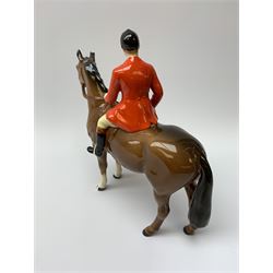 A Beswick equestrian figure modelled as a huntsman on bay horse, with printed mark beneath, together with a Beswick Norman Thelwell figure of a pony and rider, with printed mark beneath  
