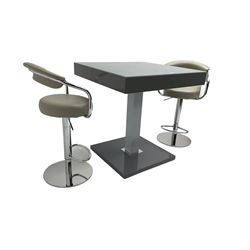 Bistro table and bar stools.