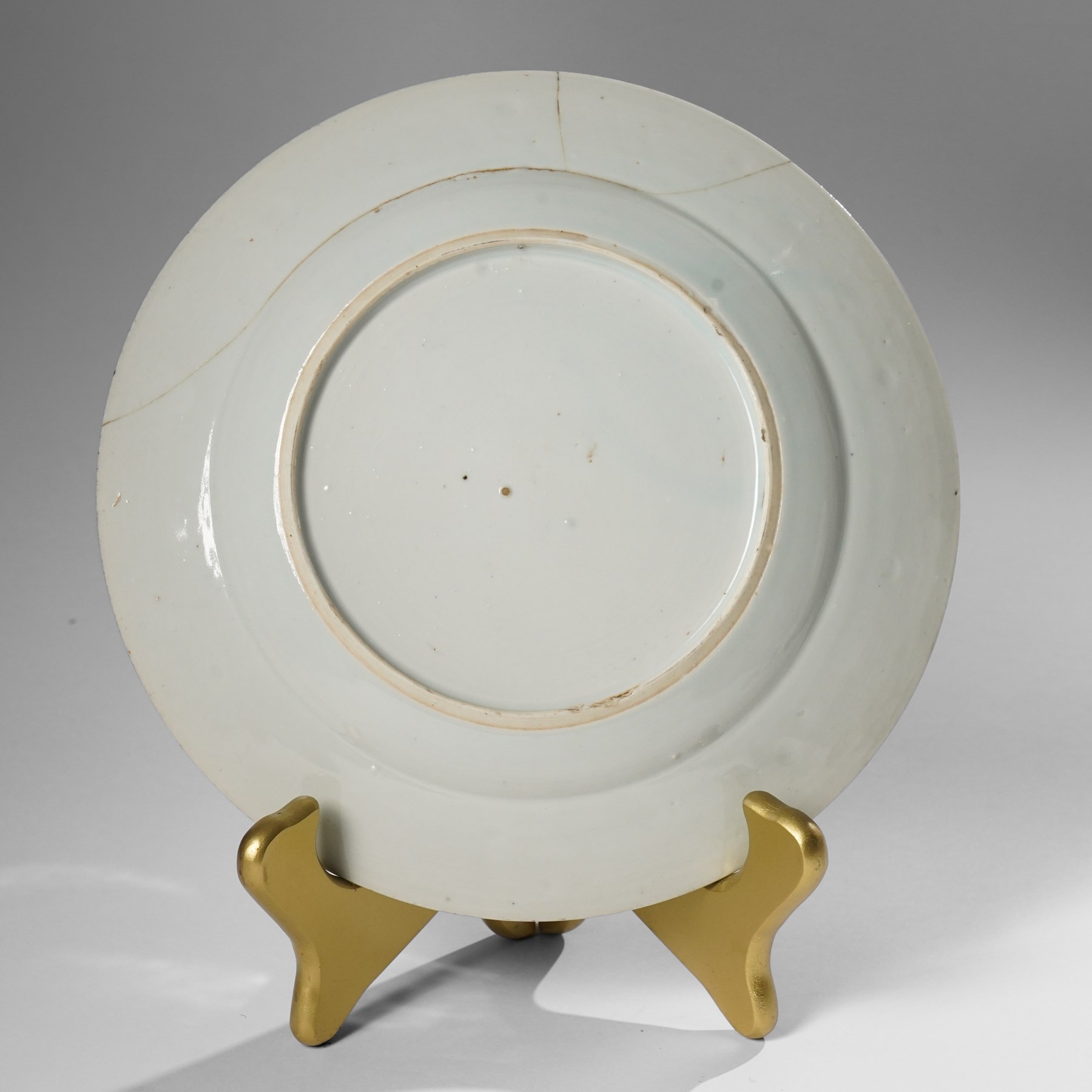 Three Chinese Kangxi period blue and white plates, painted in underglaze blue with various patterns, including Butterfly and Rockery, Pagoda and River Landscape, and floral sprays, each approx. D23cm (3)
