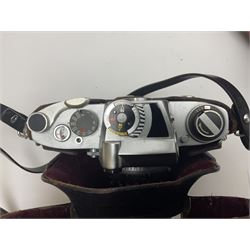 Cameras and accessories, to include Olympus OM101 Power Focus camera body, serial no 1076067, with 'Sigma AF Zoom 1:38, f=75 200mm' lens, serial no 2053714, Canon EOS 5000 camera body, serial no 1507812, with 'Canon Zoom EF 80-200mm, 1:4.5-5.6' lens, other cameras, by Miranda, Coronet and Ricoh and a collection of lenses, carry cases, etc 