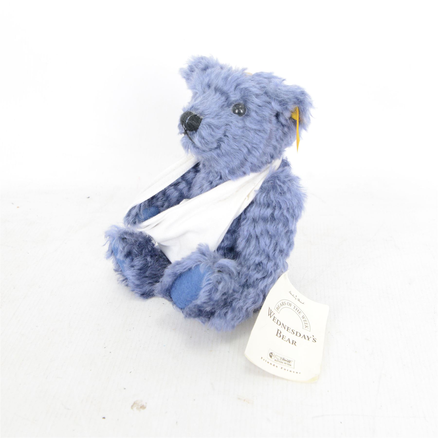 Set of seven Steiff Days of the Week Bears, issued by Danbury Mint, seven jointed bears with stitched noses, all dressed for a different day of the week, with Steiff button in ear and original tags, H24cm