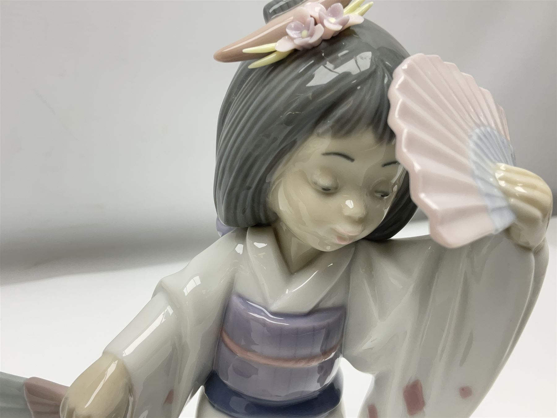 Six Lladro figures of the China doll set and Oriental doll set, comprising Playing the Flute no.6150, Bearing Flowers no.6151, Flower Gazer no. 6152, Oriental Dance no. 6230, Oriental Lantern no. 6231 and Oriental Beauty no. 6232, largest H20cm