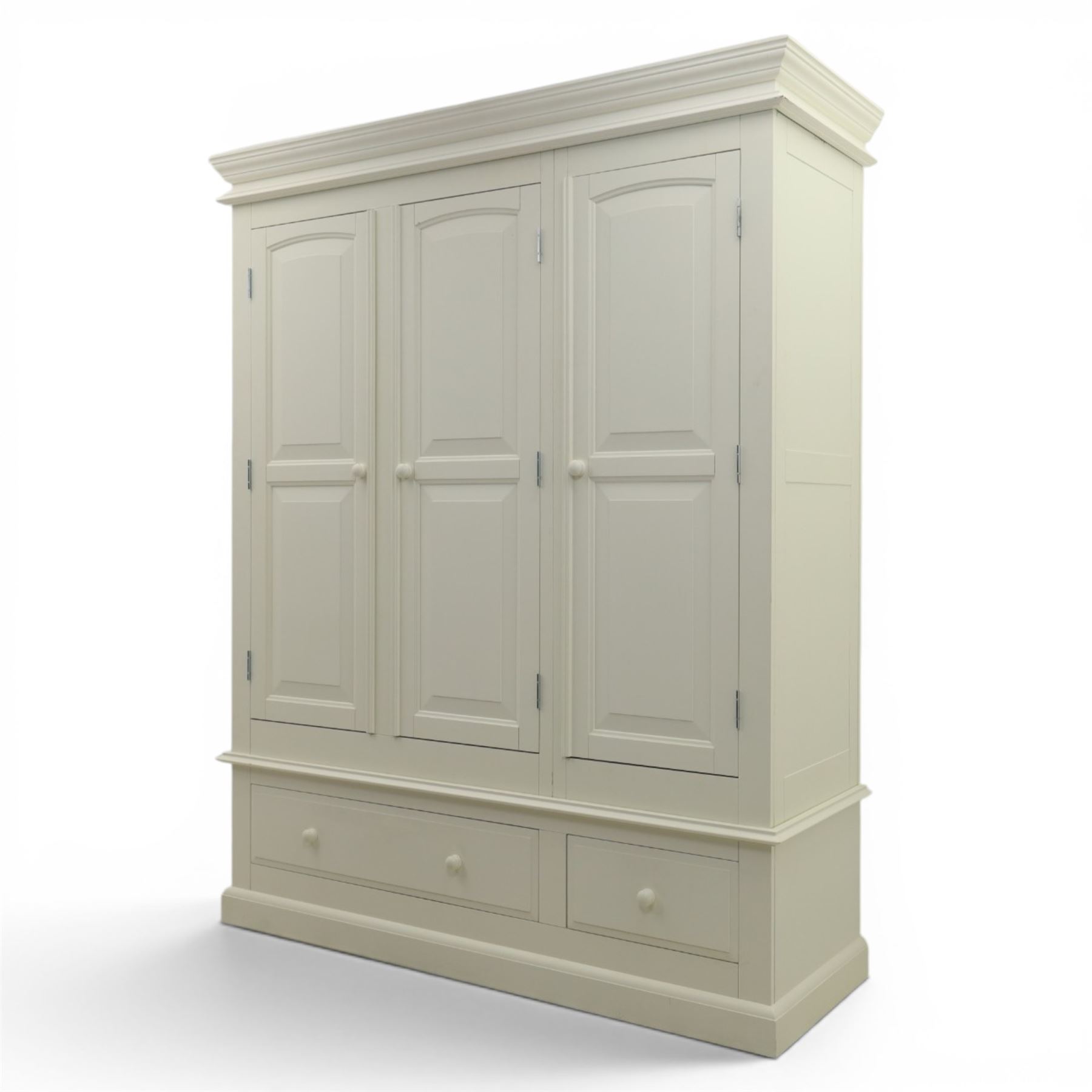 Modern white three door wardrobe, with two hanging section and shelving area, above a long drawer and a short drawer to the base, raised on a moulded plinth
