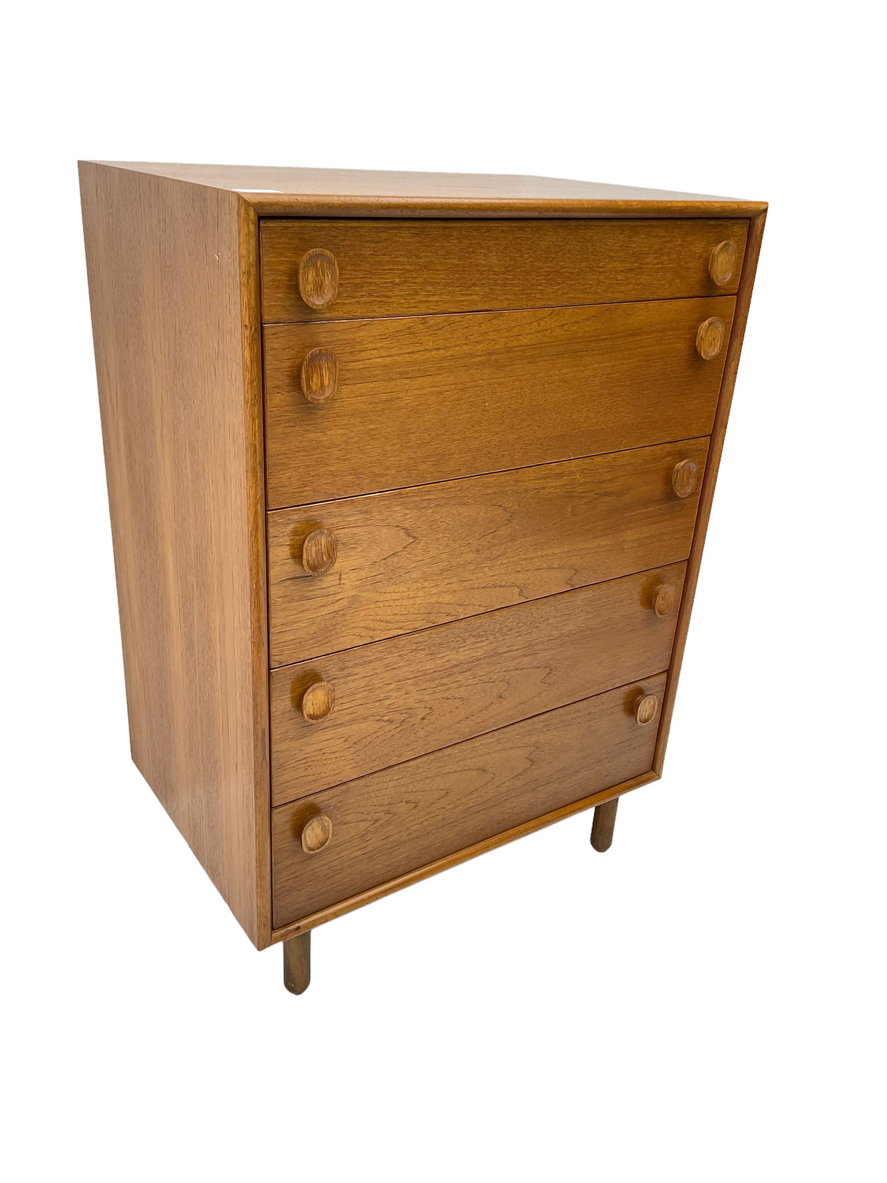 Meredew - mid-20th century teak chest of drawers, fitted with five drawers each with oval wood handles