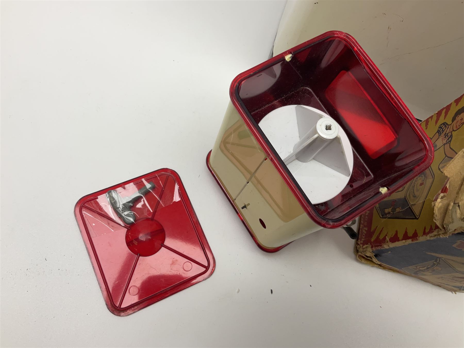 Six toy kitchen appliances - Casdon battery operated cooker; Mettoy Hoover washer; Chad Valley Hoovermatic washer; Wells Brimtoy tin-plate clockwork washer; and two Morphy Richards irons; together with a continental child's Regina sewing machine; all boxed (7)