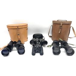Pair of British World War Two issue black-painted binoculars, Bino 7x50 No. 5, 6E/320, No. 87412, MoD.B/42, with case, together with Nipole 10 x 50 binoculars and two other pairs