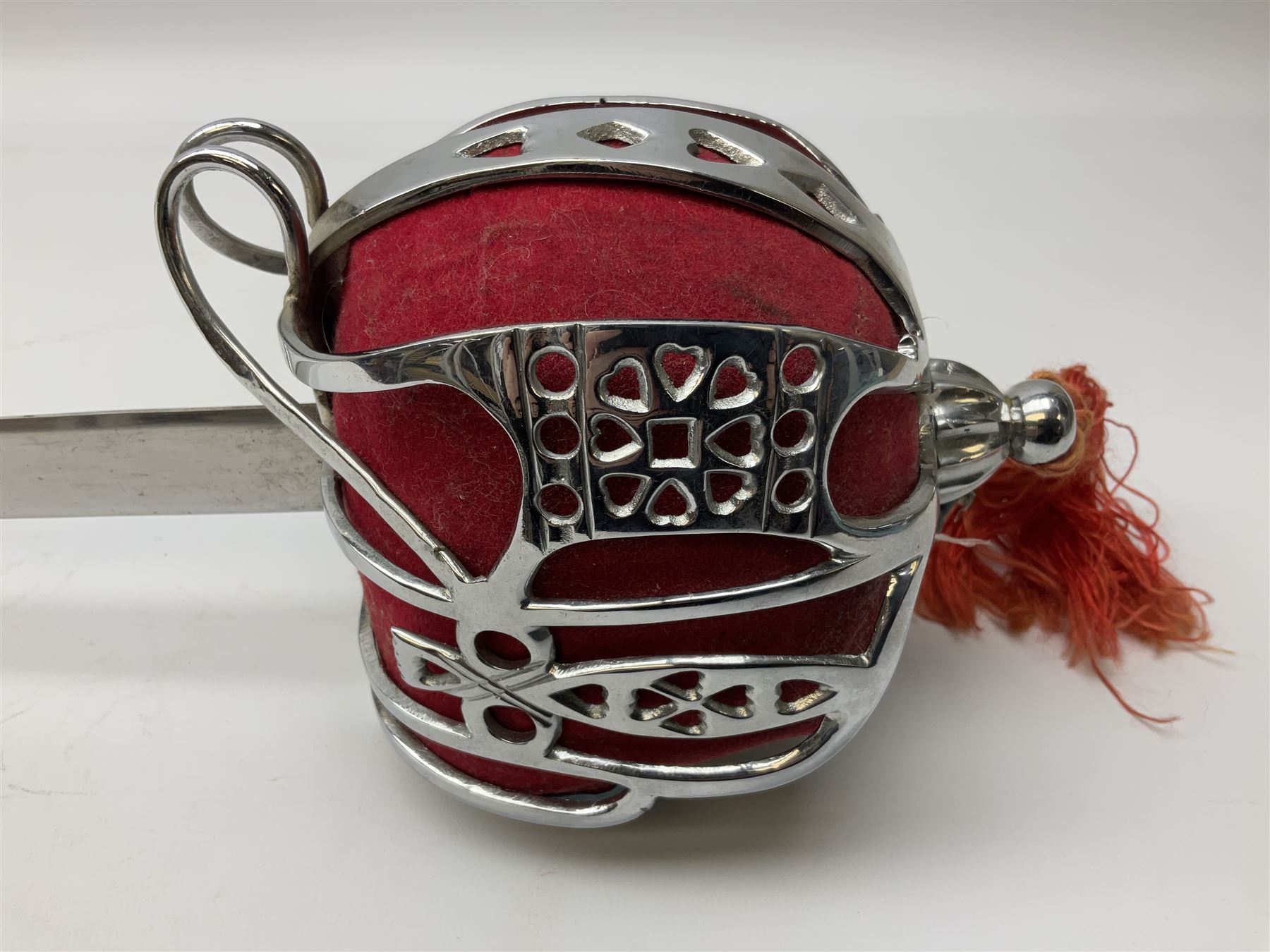 Reproduction Scottish basket hilted broadsword with 85cm double edged steel blade and red lined basket hilt with wire bound grip, in white metal mounted leather scabbard 107cm overall