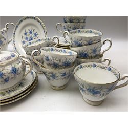 Tuscan Love in the Mist pattern tea wares, comprising teapot, fourteen teacups, fourteen saucers, fourteen side plates, milk jug, twin handled lidded sucrier, and two cake plates