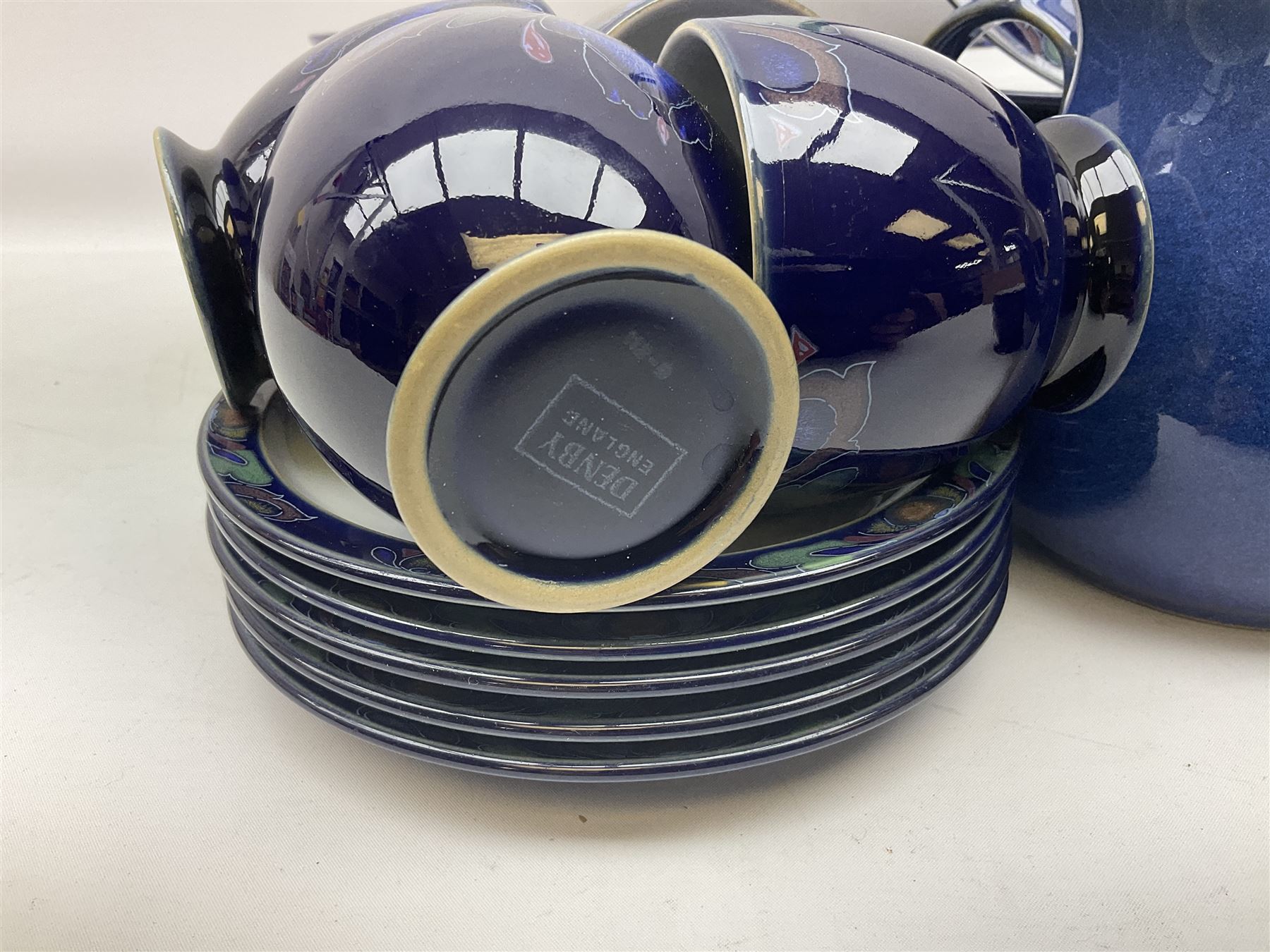 Denby Baroque pattern part tea and dinner service, comprising nine dinner plates, six side plates, six bowls five dessert plates, six cups and saucers, together with a Denby teapot and jug in Imperial blue pattern