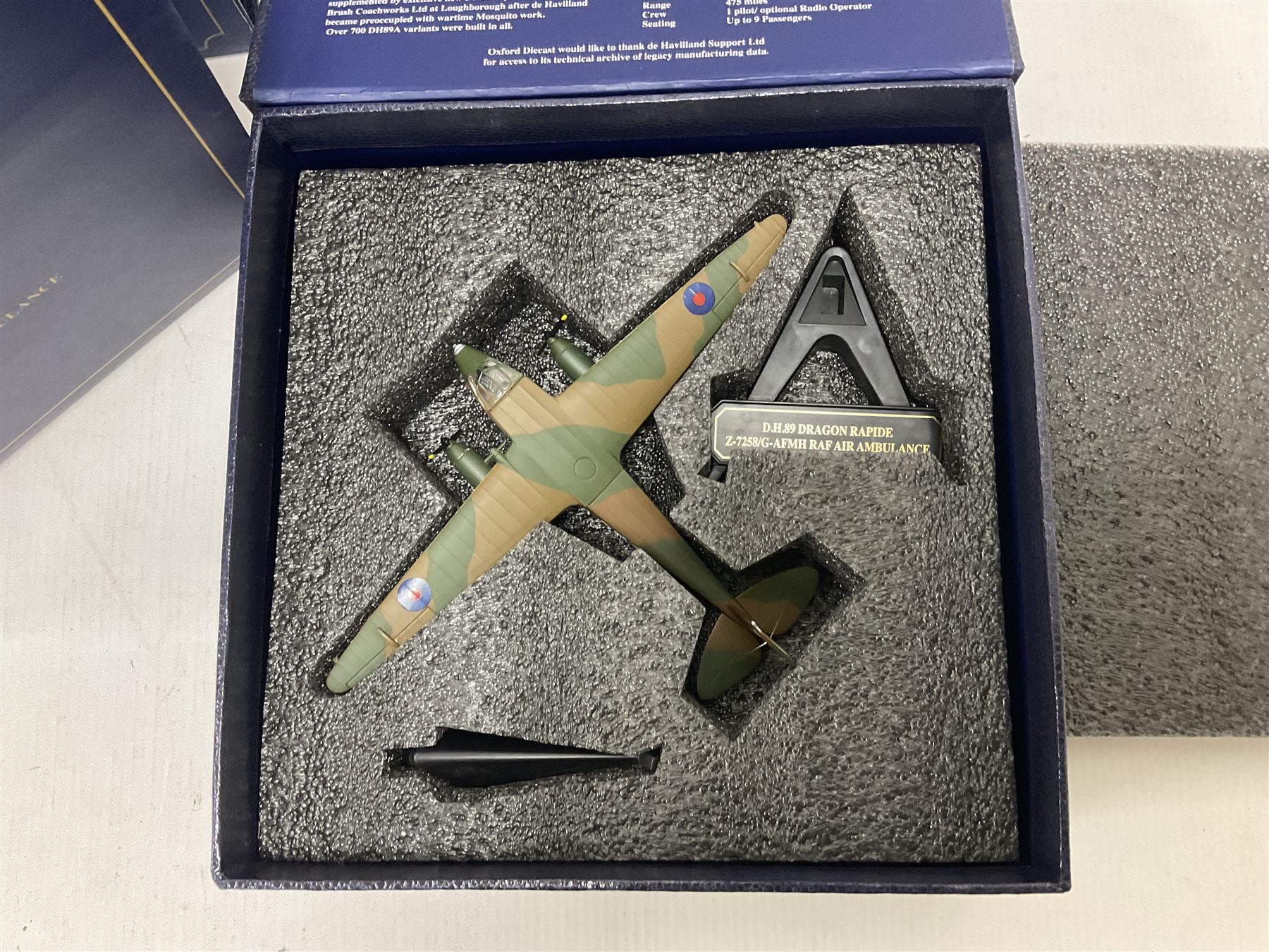 Oxford Die-Cast - four 1:72 scale model planes comprising two DH89 Dragon Rapide 72DR007 Z-7258/G-AFMH (RAF Air Ambulance) and 72DR008 0G-AIDL (Classic Air Force); De Haviland Devon C1 72DV003 VP975 Royal Aircraft Establishment; Avro Anson Mk1 72AA002 217 Sqn. RAF Coastal Command; in original boxes (4) 