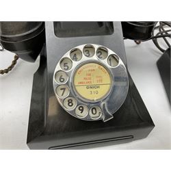 Three vintage Bakelite black telephones, each with chrome dial, one marked 'Standard London'