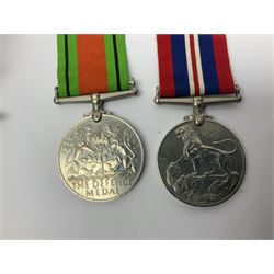 WWI pair of medals comprising British War Medal and Victory Medal awarded to 32682 Pte. W. Meadows W. Rid. R. in issue box; WWI pair of medals comprising 1914-15 Star and Victory Medal awarded to 3720 Pte. (later Cpl.) E. Petty W. York. R. with issue letter from Tank Corps; WWII group of five medals comprising 1939-45 War Medal, Defence Medal and 1939-45, Italy and Africa Stars; all with ribbons; and book of nineteen seaman's Certificates of Discharge to cook Charles Filburn 1893 - 1901 from various British ports