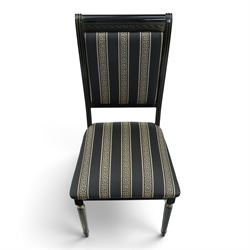 Italian Neoclassical inspired ebonised gloss dining table with four matching chairs,  circular top with additional leaf (Extends to  145cm) with Greek key banding, on a shaped pedestal base with gilt highlights and stepped plinth, the chairs en suite with padded back and seat with Greek key, reeded front supports