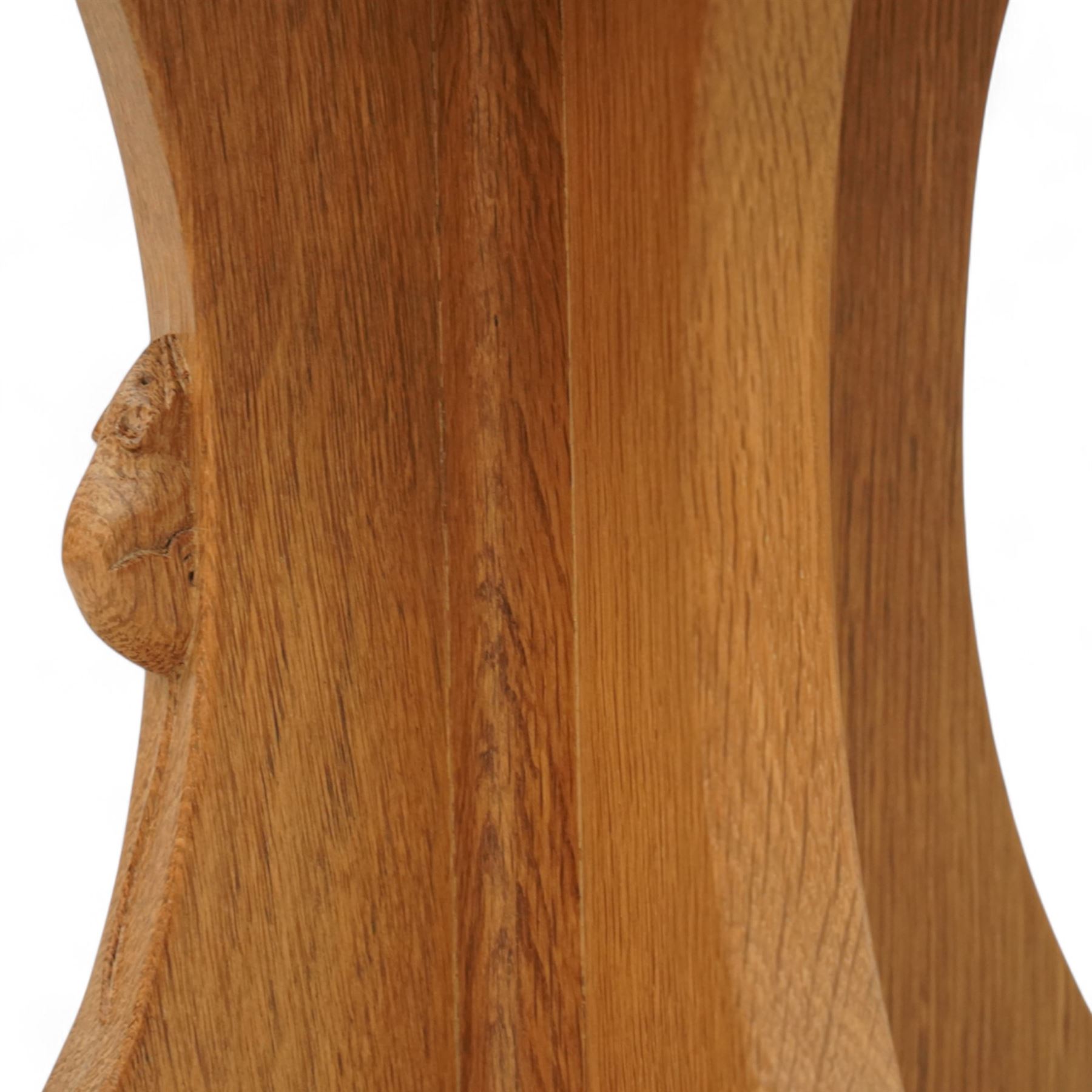 Mouseman - oak coffee table, octagonal adzed top on cruciform base and sledge feet, carved with mouse signature, by the workshop of Robert Thompson, Kilburn