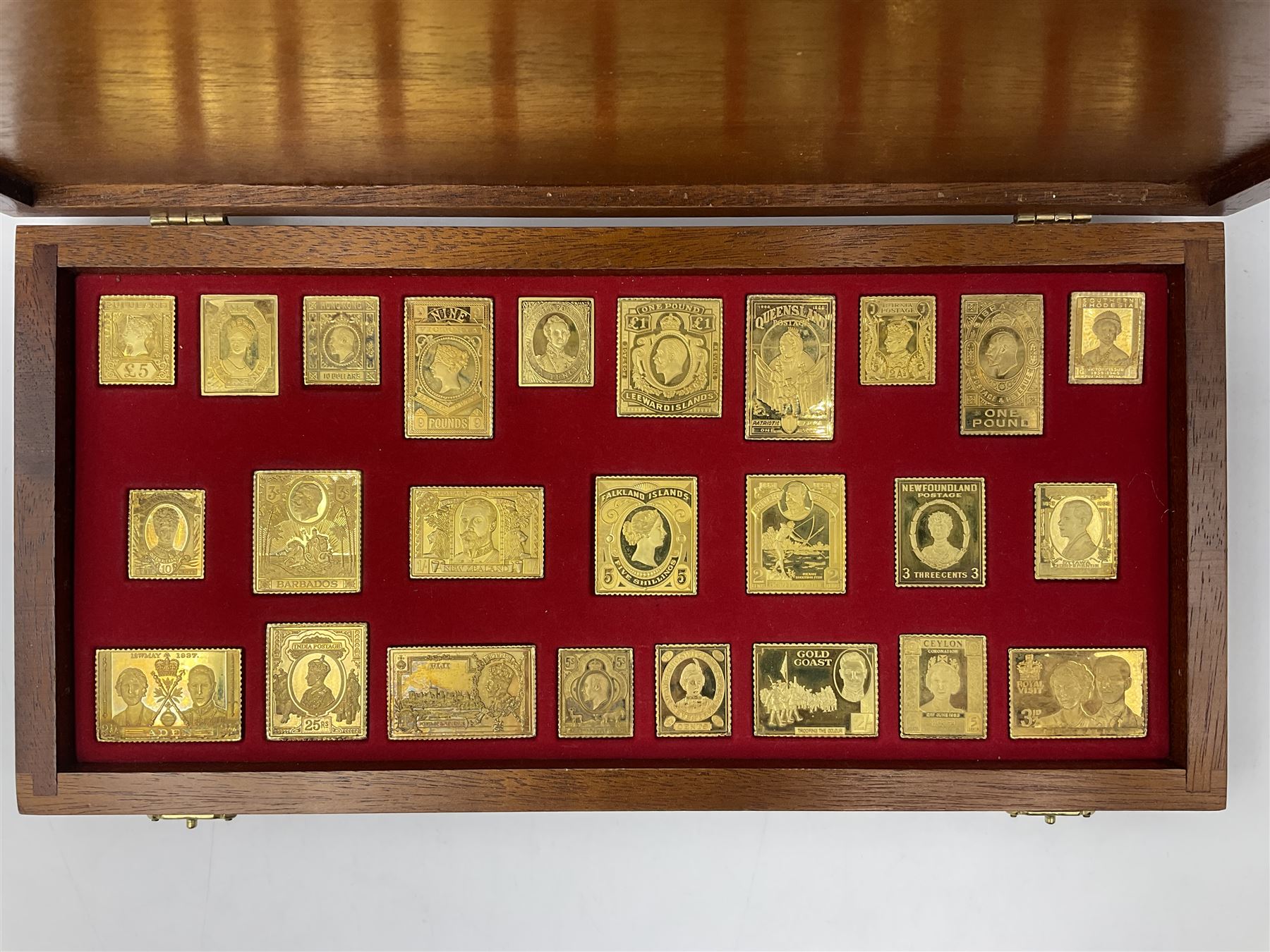 Danbury Mint sterling silver hallmarked stamp ingot set of twenty-five, housed in a fitted wooden case