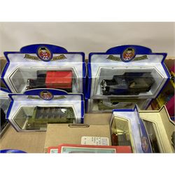 Collection of Tetley Tea collectibles to include sixteen 1:43 scale model cars from Lledo and Oxford Die-Cast with further Tetley Tea figures and tinned coaster set