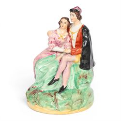 Rare Staffordshire pottery figure group, circa 1852, modelled as Romeo and Juliet, both se...