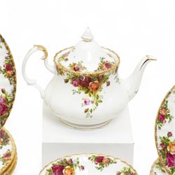 Royal Albert Old Country Roses tea and dinner service comprising four dinner plates, four dessert plates, four soup bowls, six cups, seven saucers, twelve side plates, tea pot, supper plate with mug and saucer dish