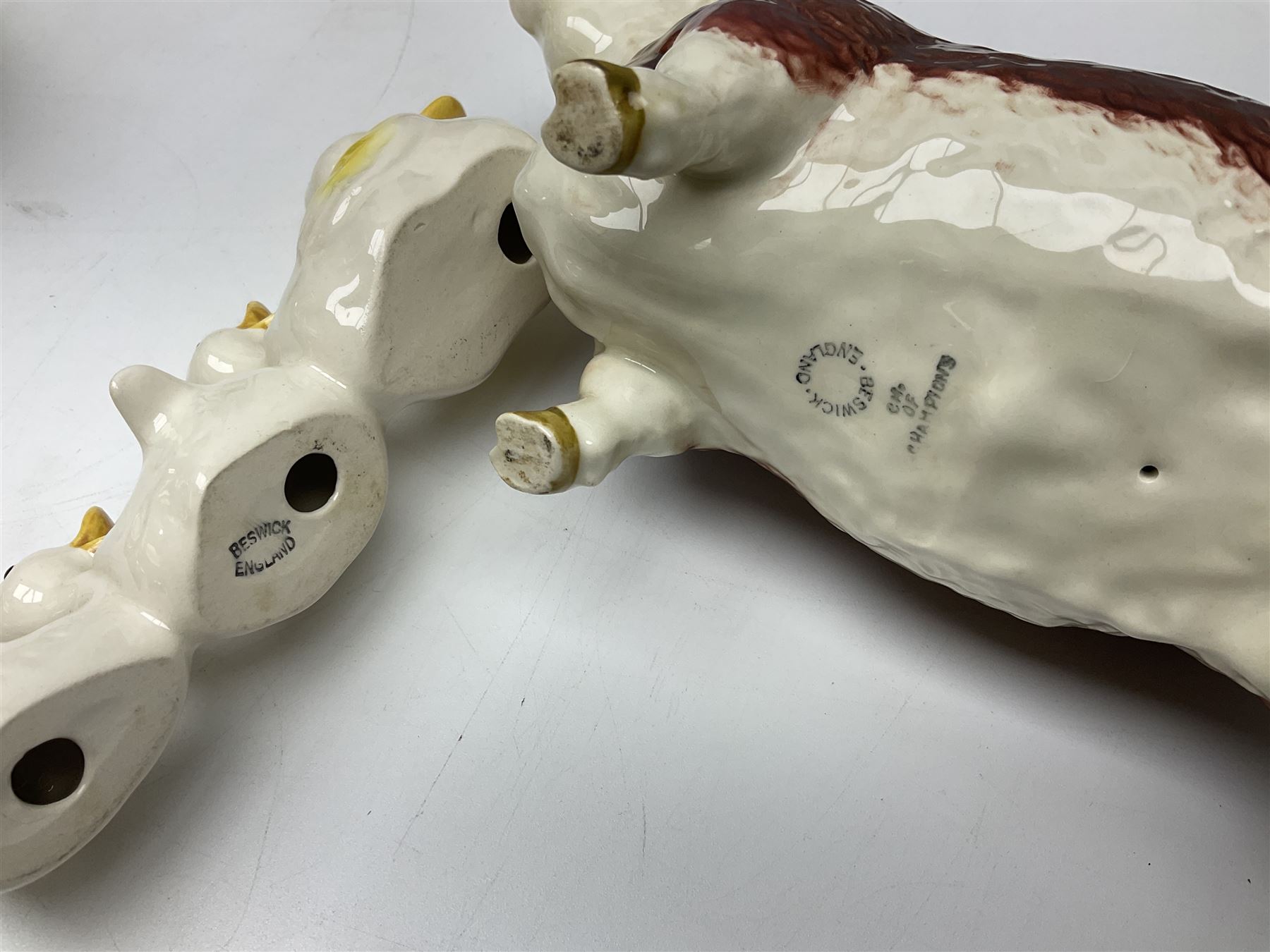 Beswick Champion of Champions Hereford bull figure no 1360, Beswick Norman Thelwell An Angel on Horseback no 2704A, and three other Beswick figures to include Arab Bay horse, Mallard and Comical Duck Family, all with printed or impressed marks beneath, largest H17.5cm