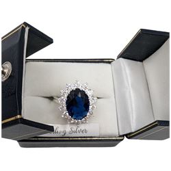 Silver blue stone and cubic zirconia oval cluster ring, stamped 925, boxed 