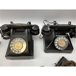 Three vintage Bakelite black telephones, each with chrome dial, together with additional plinths and Bakelite headsets