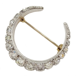 9ct white and yellow gold graduating diamond crescent moon brooch, London 1973, total diamond weight approx 0.80 carat