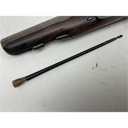 Early 19th century 16-bore flintlock single barrel travelling pistol, the 21.5cm stub twist octagonal barrel with two barrel pins and ramrod under, engraved lock plate with roller frizzen, engraved trigger guard with pineapple finial, walnut stoock with chequered grip L40cm overall