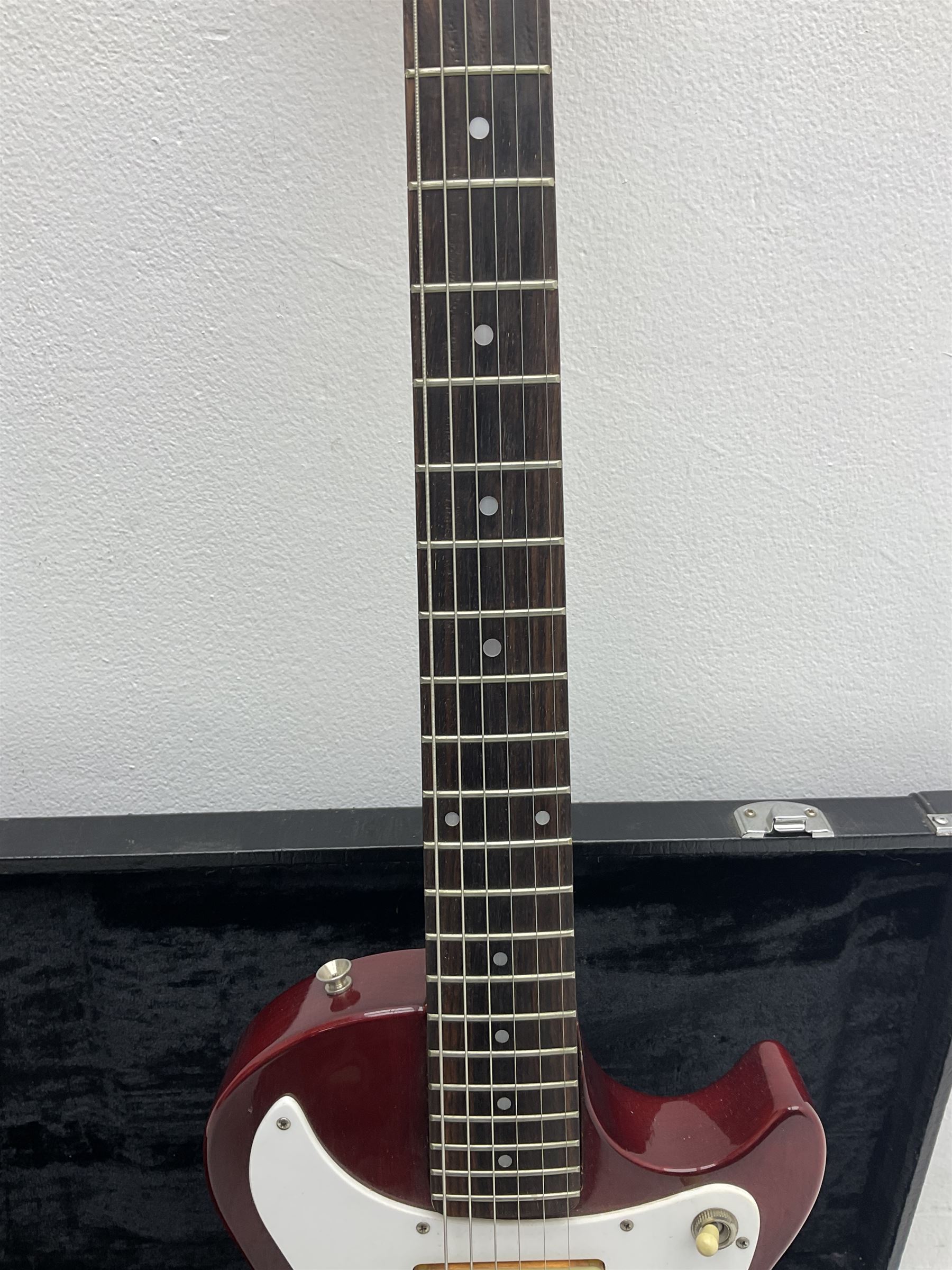 Gibson Marauder style six-string electric guitar with cherry coloured body, marked made in Japan L101cm; in locking hard carry case