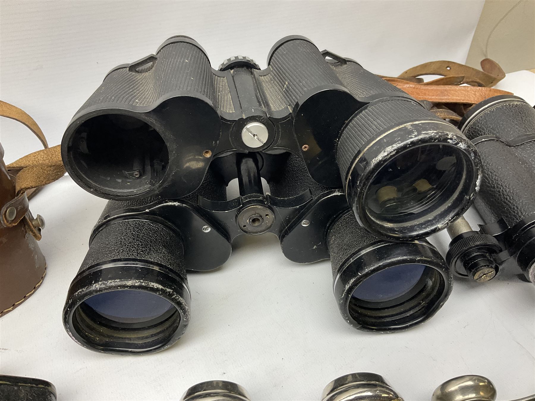 Quantity of binoculars for spares and repair, to include Cogswell & Harrison Primic 8x30, Prinz 8x30, Telstar 35x60, Zeiss Wetzland 8x40 etc