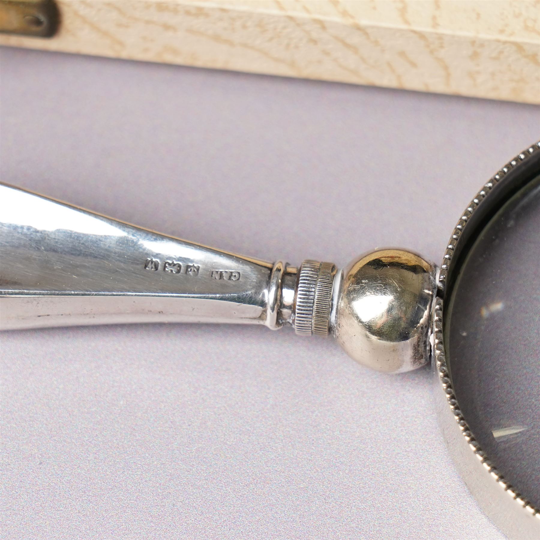 Silver three piece condiment set London 1973-1976 Maker C J Vander Ltd, George III silver sauce ladle London 1798, five silver coffee spoons, Dutch pierced silver server, silver handled knife, silver handled magnifying glass and small silver dish