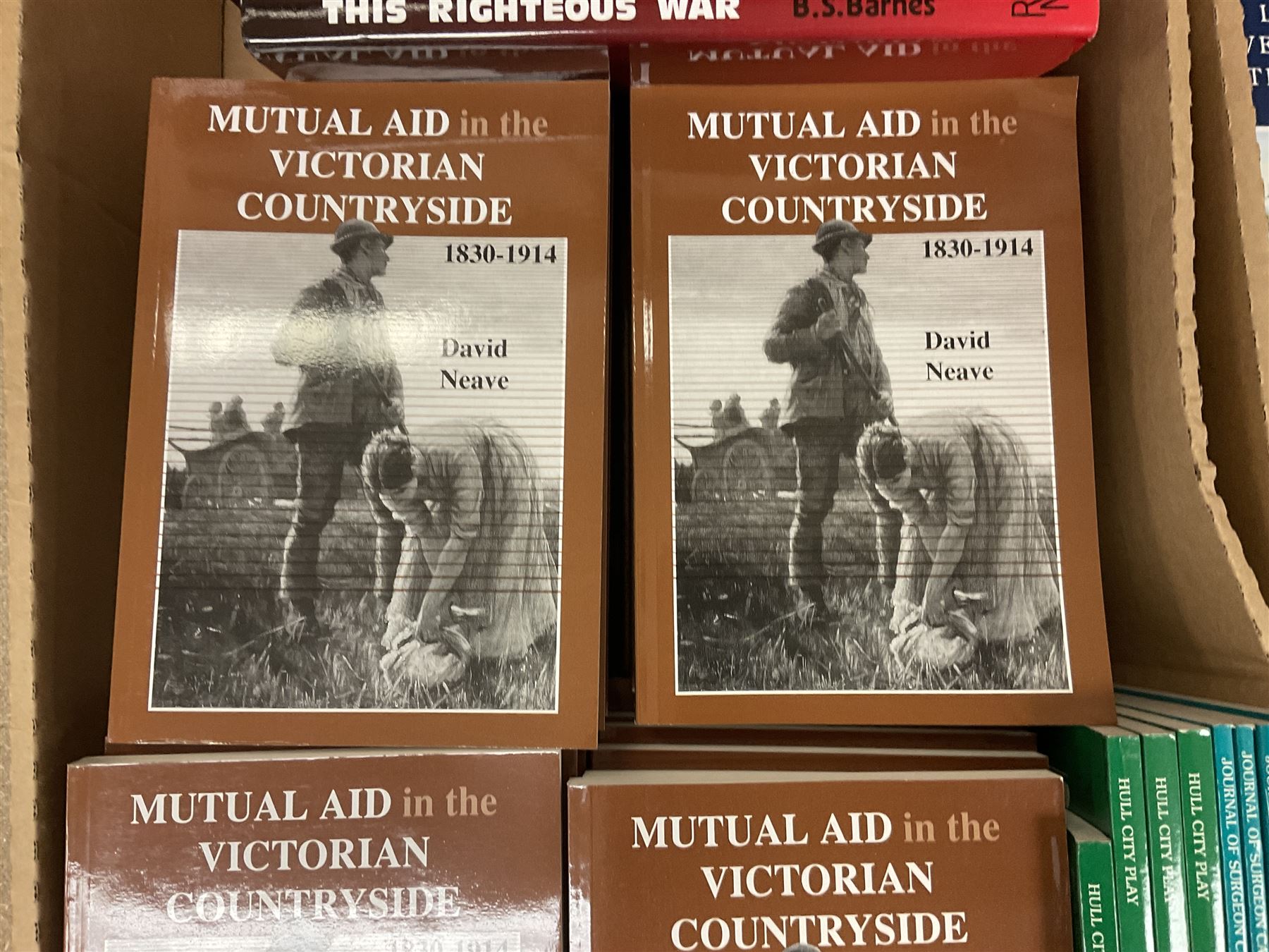 Books - Thirty seven copies of Mutual Air in the Victorian Countryside 1830-1914 by David Neave, four copies of Voices of Hull Real-Life Stories from the Hull City Play edited by Trevelyan Wright, four copies of The Journal of Surgeon Cass Aboard the Whaler 'Brunswick' of Hull, 1824 edited by A G Credland, four copies of This Righteous War by B S Barnes, four copies of Flying Sail Humber Keels and Sloops by Michael E Ulyatt, four copies of Old Beverley by Philip Brown, etc., in two boxes 