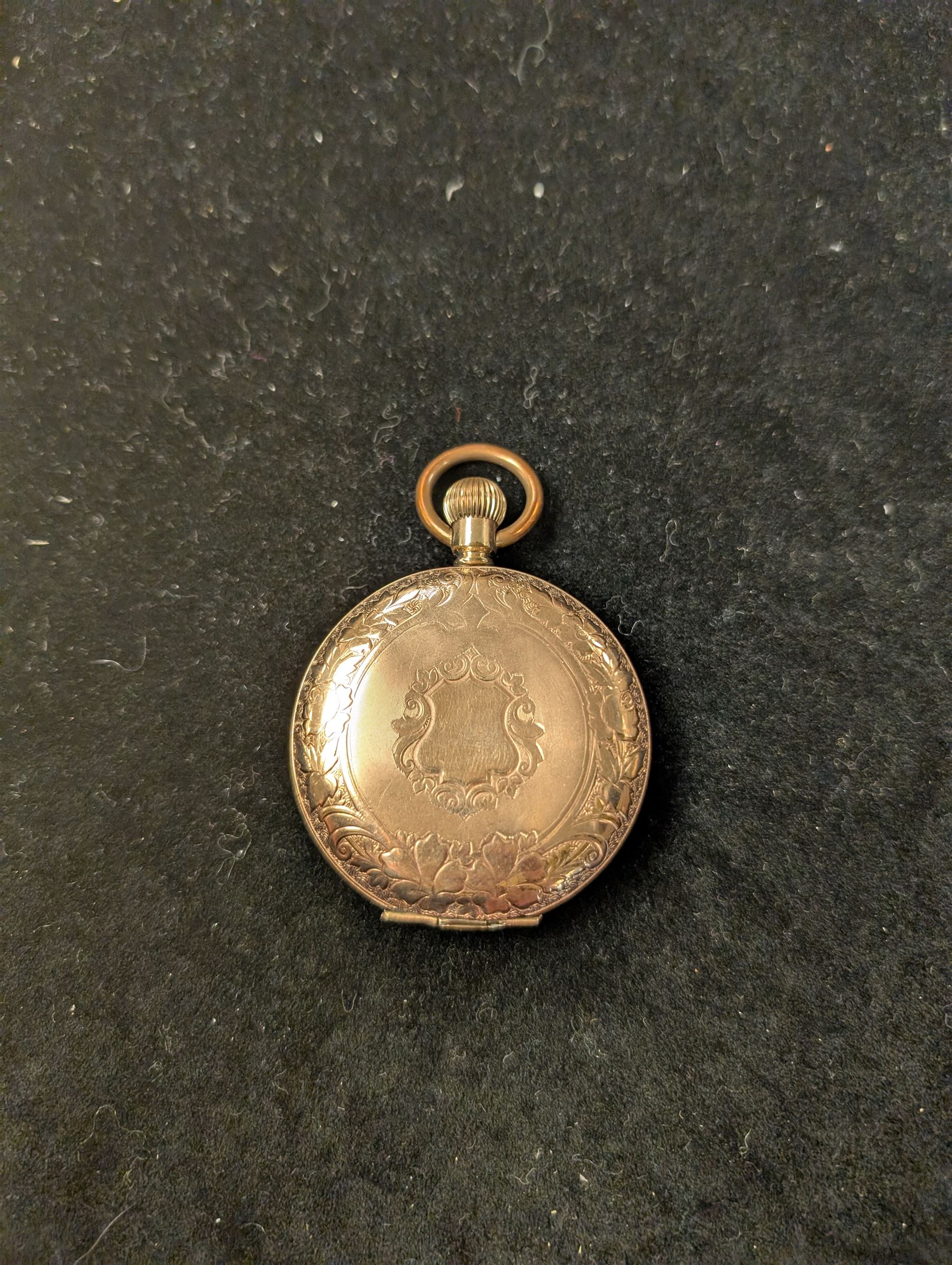 Waltham USA gold plated full hunter pocket watch, the white enamel dial with subsidiary seconds dial, the front cover engraved and embossed with blank cartouche in a floral border, the back cover engraved with stag