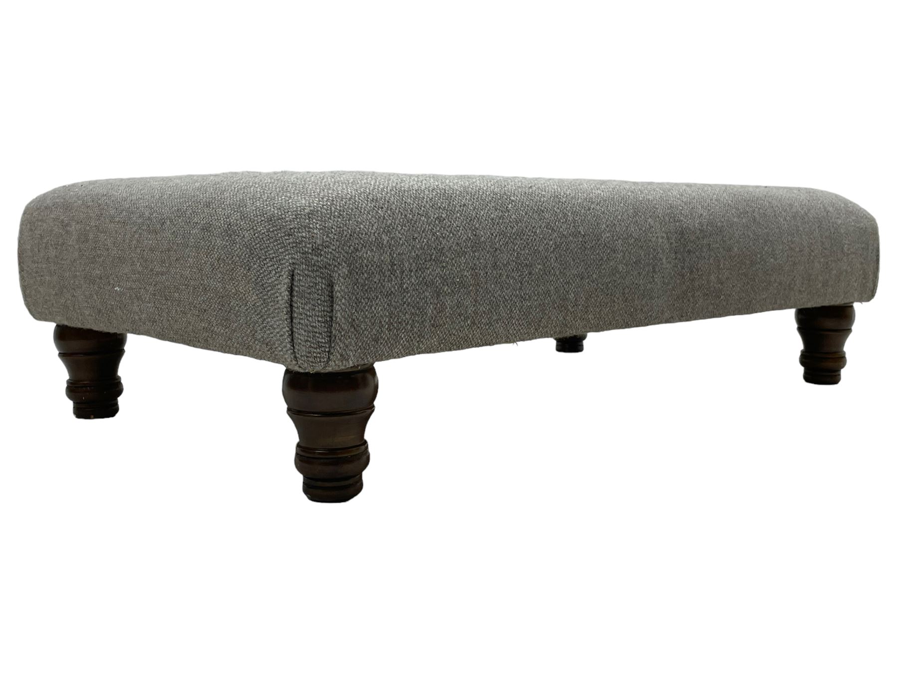 Interiors at Nine to Eleven - traditional rectangular footstool, the padded seat upholstered in neutral grey 'Harris Tweed' fabric, raised on turned feet