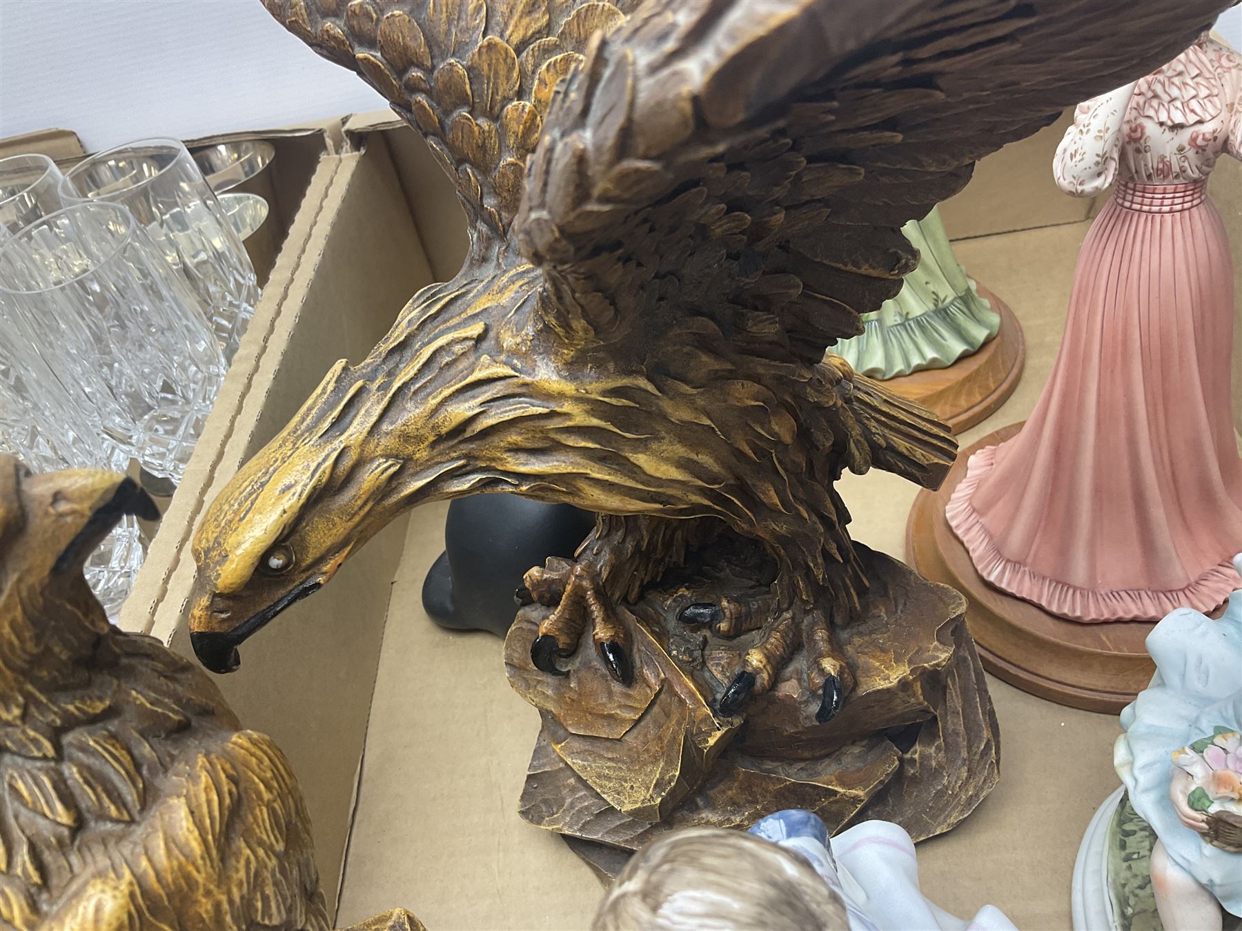 Franklin Heirloom Victorian christening doll, six children's annuals including star Wars annual No.1, Coalport Visiting Day figurine, set of six cut glassl champagne flutes, sliver plated tea service, two carved eagle figures and a collection of other ceramics and glassware, in three boxes