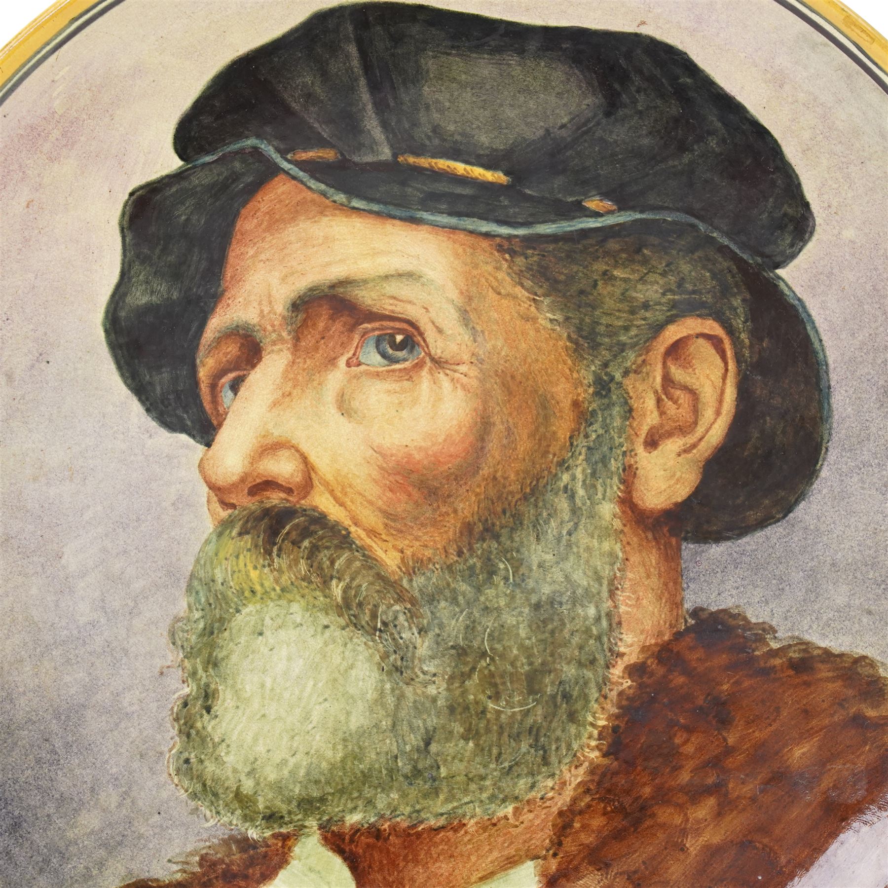 Pinder Bourne & Co hand-painted faience charger, c1879, by James R Cruickshank, depicting a bearded man in a tied black cap, impressed mark and with artists monogram to base, D40cm