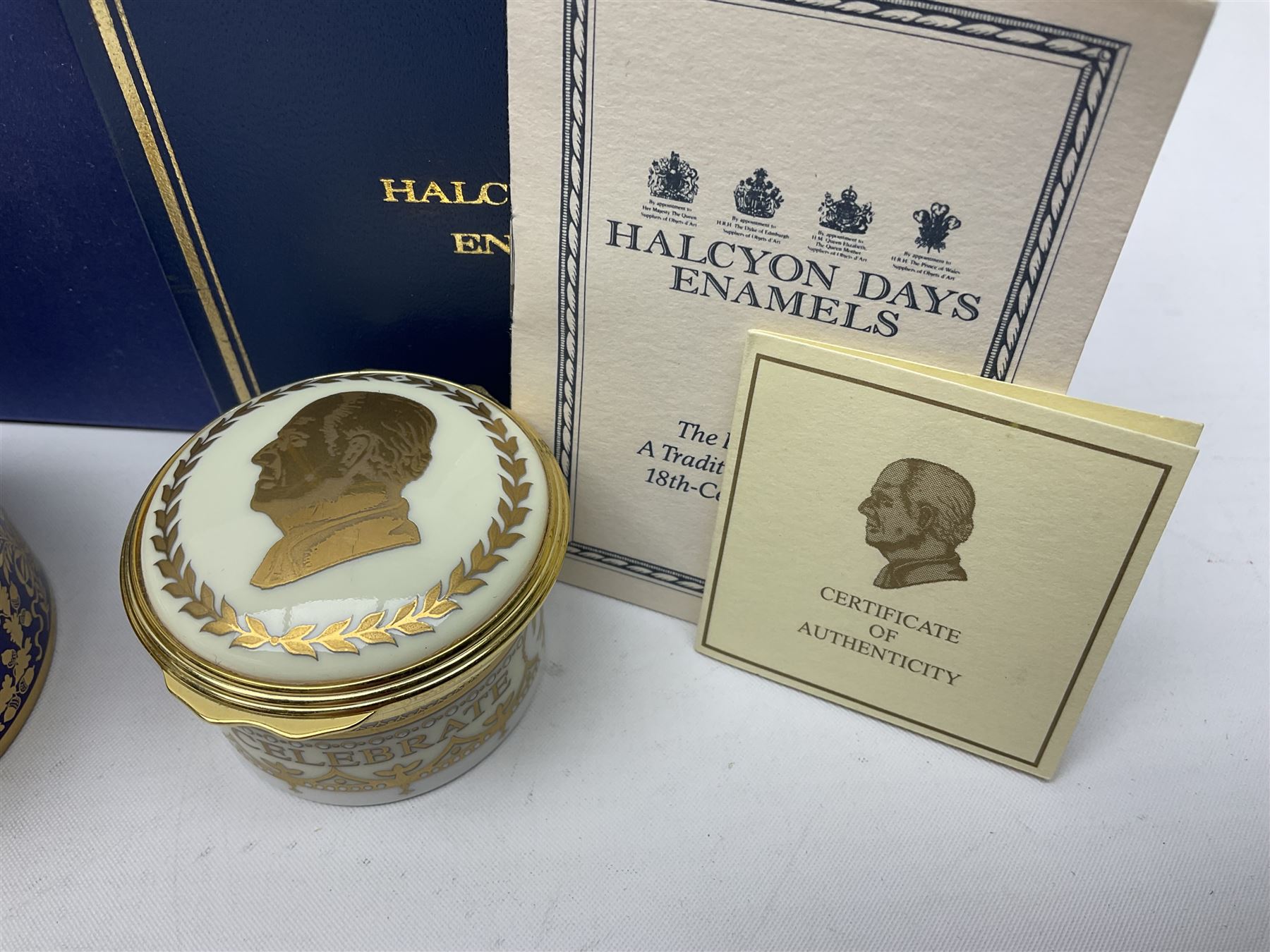 Five Halcyon Days Royal commemorative enamel boxes and one other
