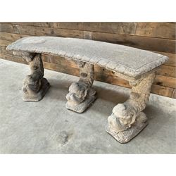 Cast stone four piece curved Dolphin bench, set with three dolphin pillars, curved rectangular slab top with detailed border