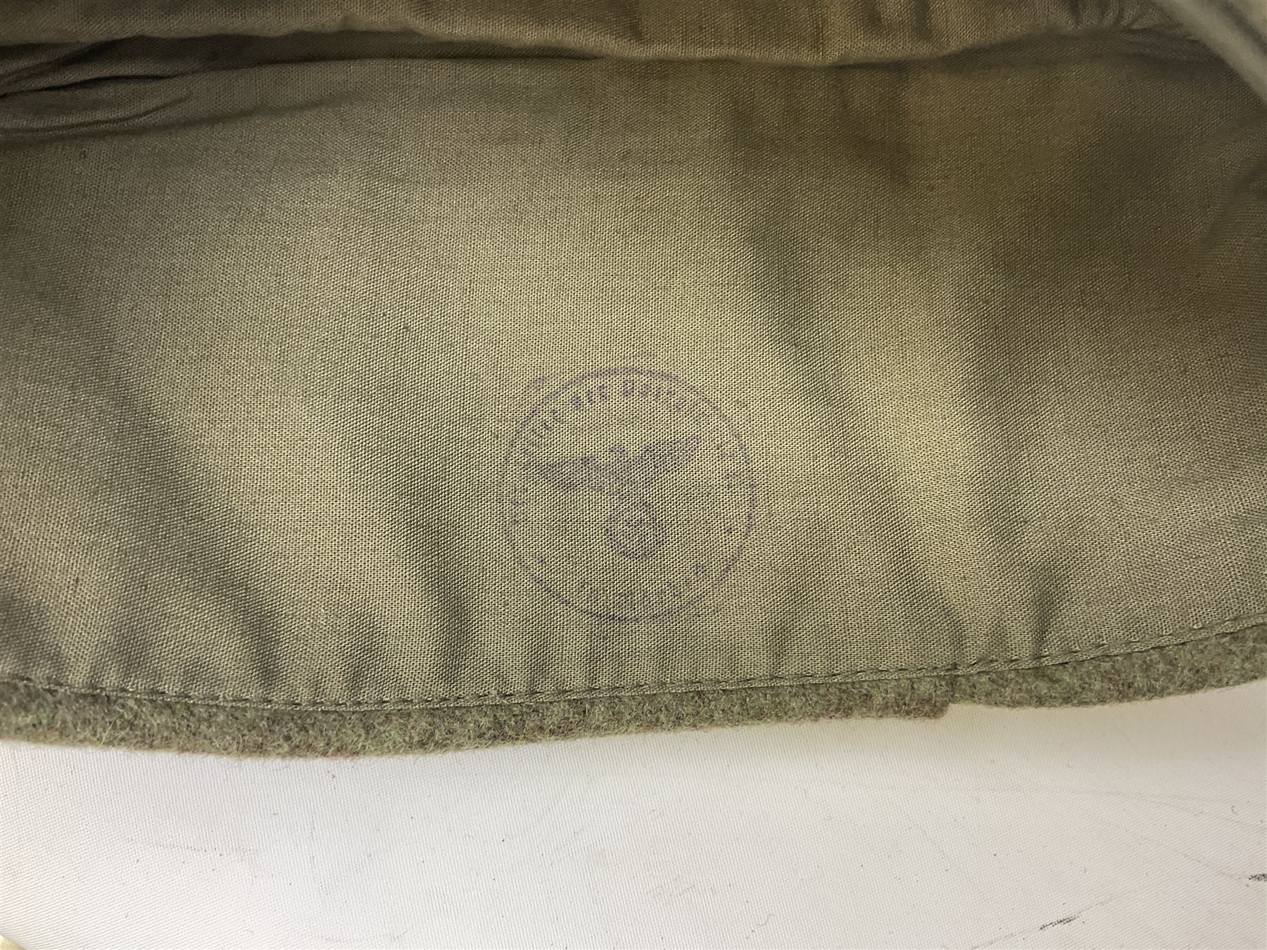 Five reproduction German WW2 hats comprising Wehrmacht olive tropical helmet, Heer officer's peaked cap, two M43 caps and Field side cap (5)