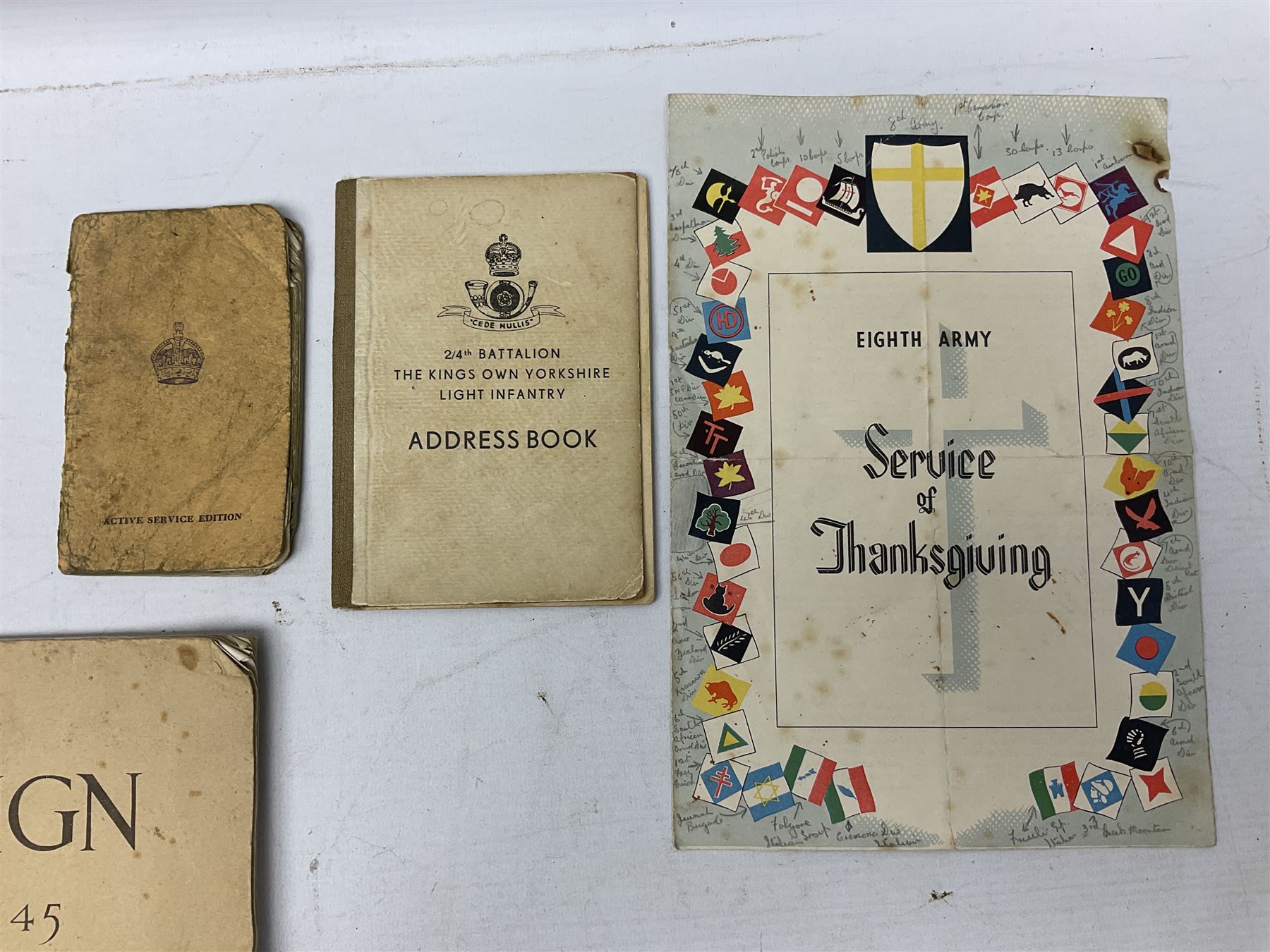 Modern album containing over sixty postcards and photographs including memorial portraits of KIA soldiers, regimental crests, comic, WW1 embroidered silk, uniforms, cap badges, camp and manoeuvre images etc; another personal photograph album of WW2 soldiers relaxing; Royal Armoured Corps booklet 'The Italian Campaign 3rd Sep. 1943 - 2nd May 1945; and other paper ephemera of military interest